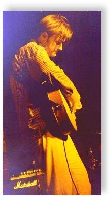 Rob, playing my accoustic guitar for Disneyhead